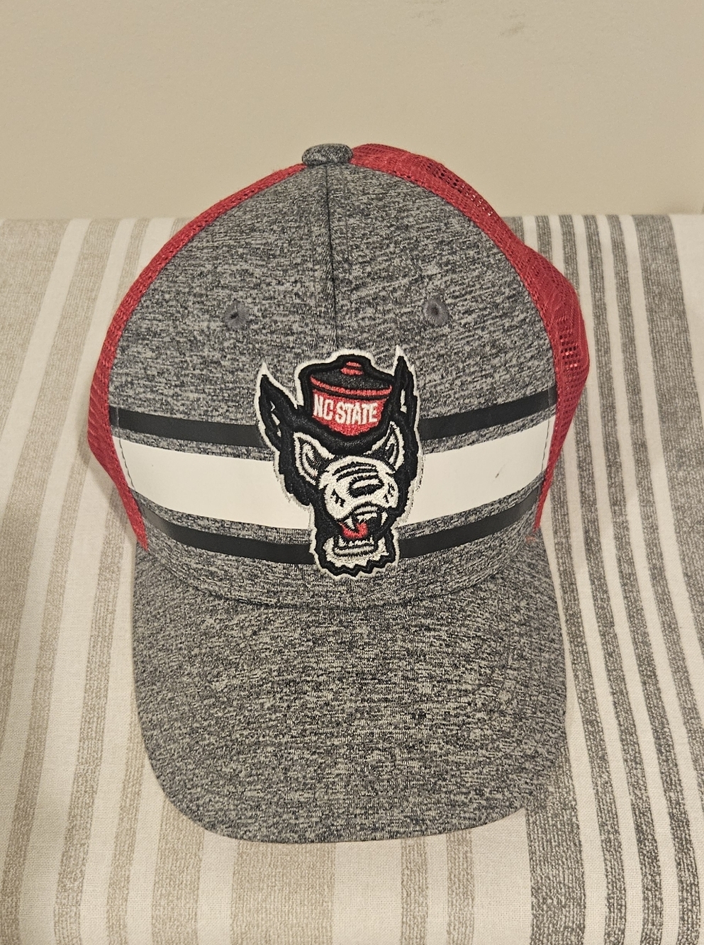 Gray & Red Trucker Hat with 'No State' Wolf Patch